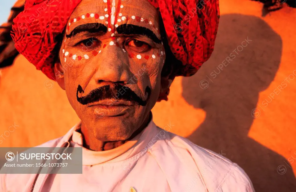 Folk dancer before performing the Kachhi ghodi dance. From Rajasthan, India. The Kachhi ghodi dance can be translated in the horse dance in english. T...