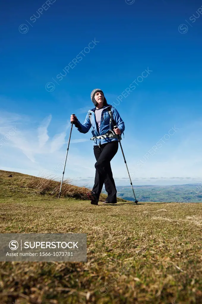 Female hiker hiking near Hay Bluff, Black Mountains, Wales