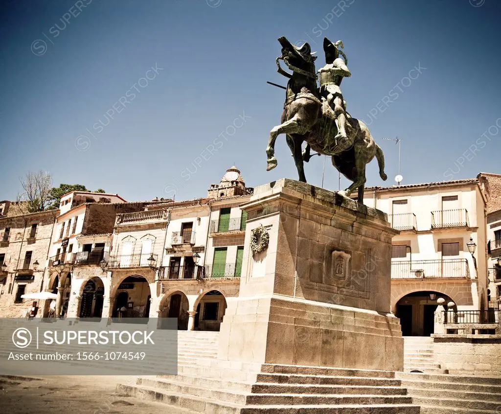 Statue of Pizarro and St  Martin´s church 15th-16th century in Main Square, Trujillo  Caceres province, Extremadura, Spain