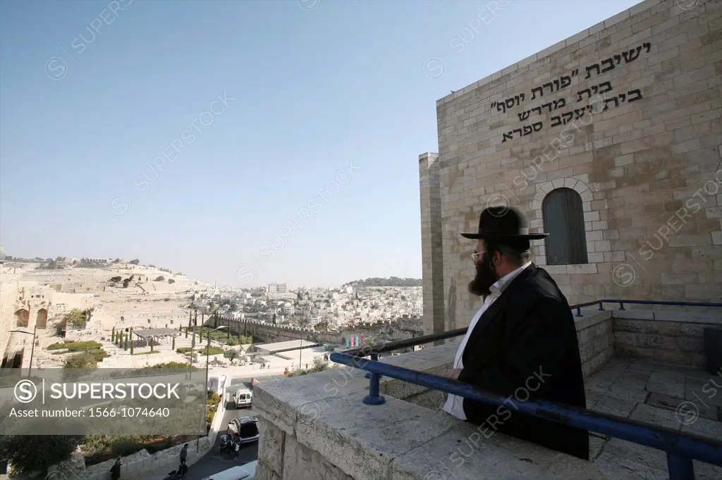 A Jewish man at the Western wailing wall in Jerusalem