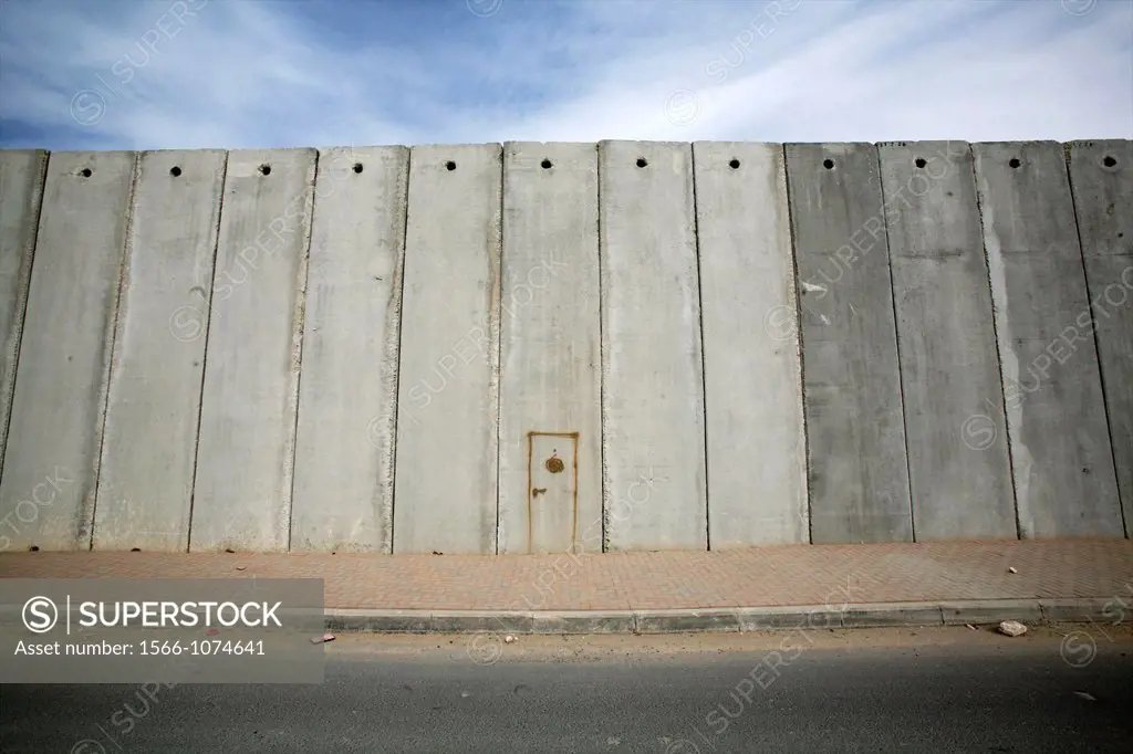 A door drawn on the wall Israel is building around the west bank territories, blocking access for Palestinians who feel imprisoned by it