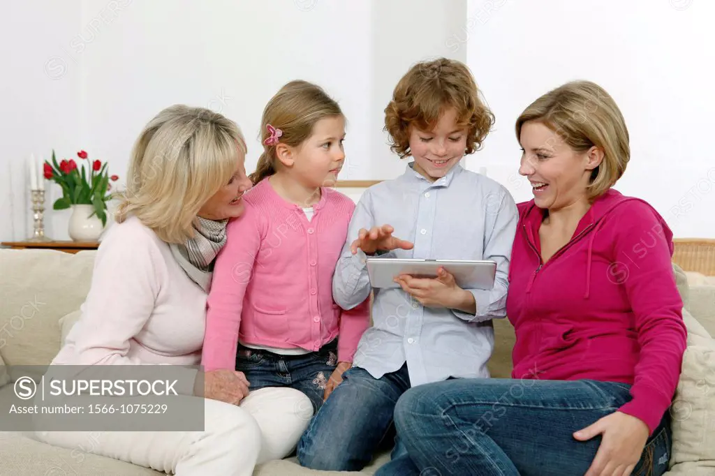 Family using tablet computer