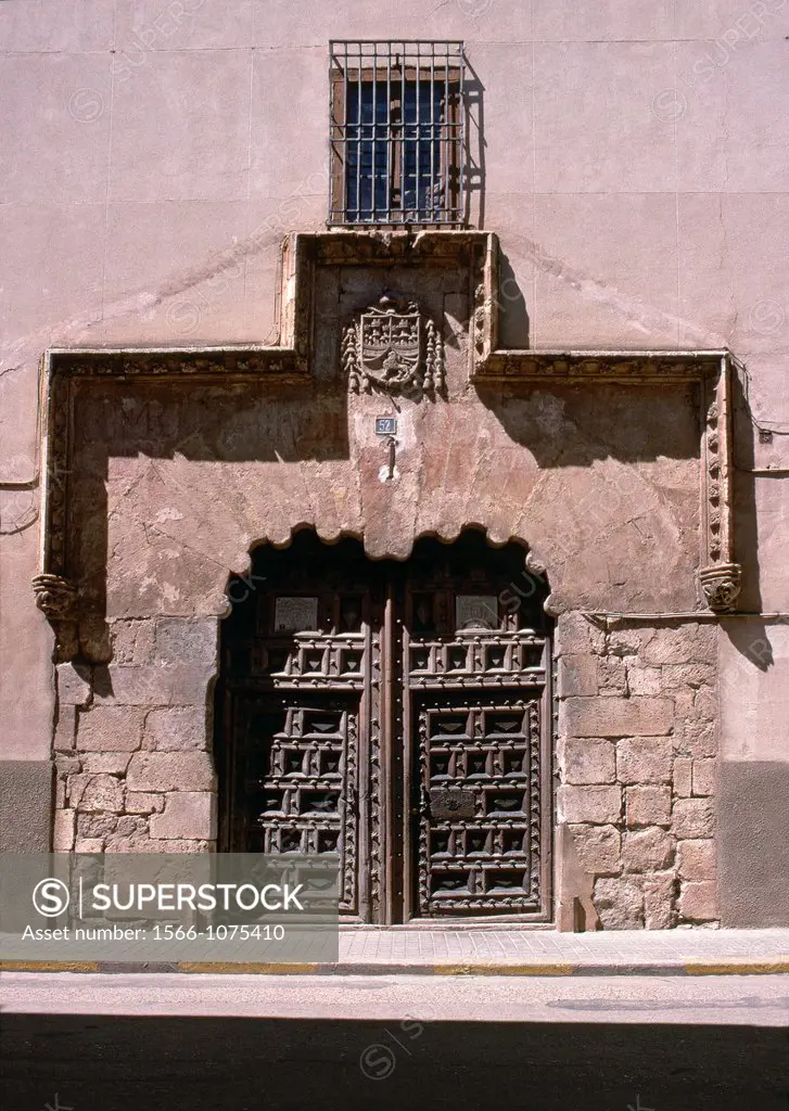 The late gothic doorway to the Palacio Episcopal in the Calle Mayor in El Burgo De Osma, Soria province, Spain