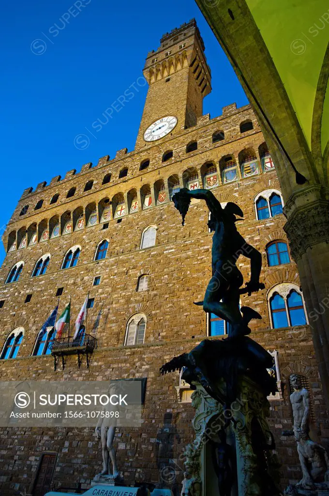 Statue of Perseus by Cellini and the Palazzo Vecchio  Piazza della Signoria, Florence, Tuscany, Italy.