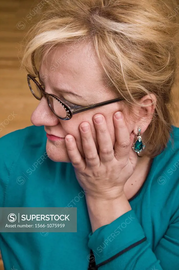 Blonde woman wearing glasses