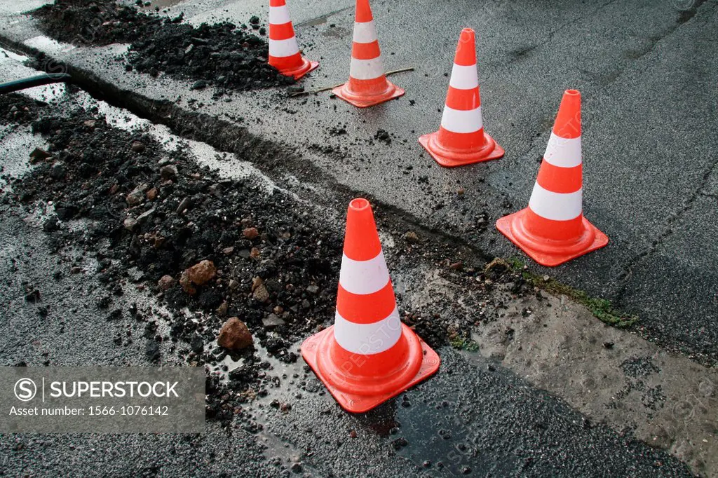 traffic cones by urban road works in city town