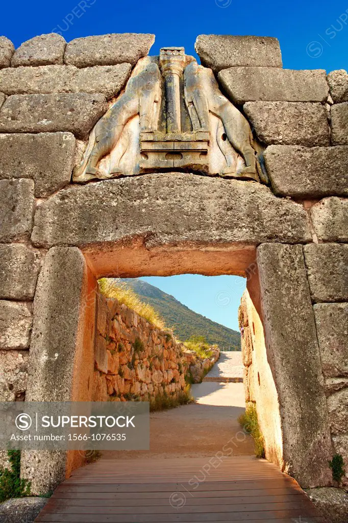 Mycenae Lion Gate & citadel walls built in 1350 B C and known as cyclopean style walls due to the vast size of the blocks it was assumed by visitors i...