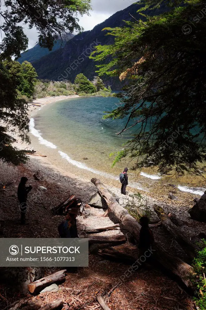 Hikers on the shores of Lago Paimun, Lanin National Park, Neuquen, Argentina