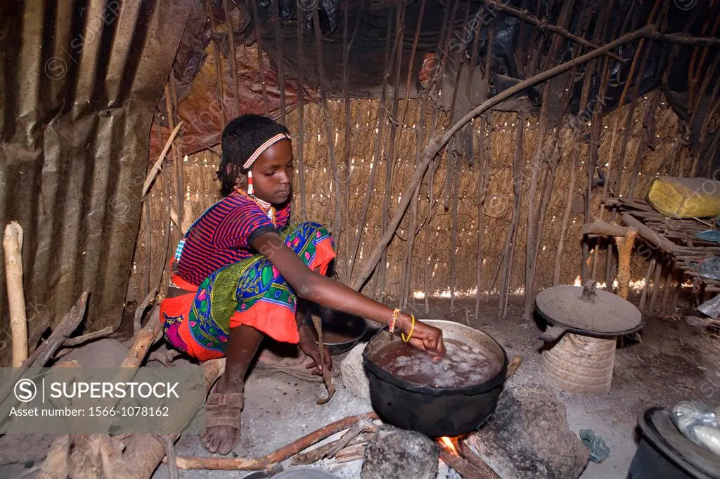 The Afari Northern Etiopie were originally nomads and live in very primitive huts made of straw, twigs and a piece of plastic living conditions are ha...