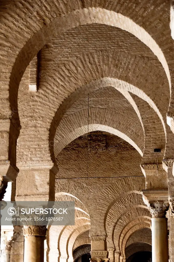 North Africa, Tunisia, Kairouan. Holly city. The Great Mosque Sidi Okba, World Heritage of Unesco. Sacred place of Islam. The arches, architecture det...