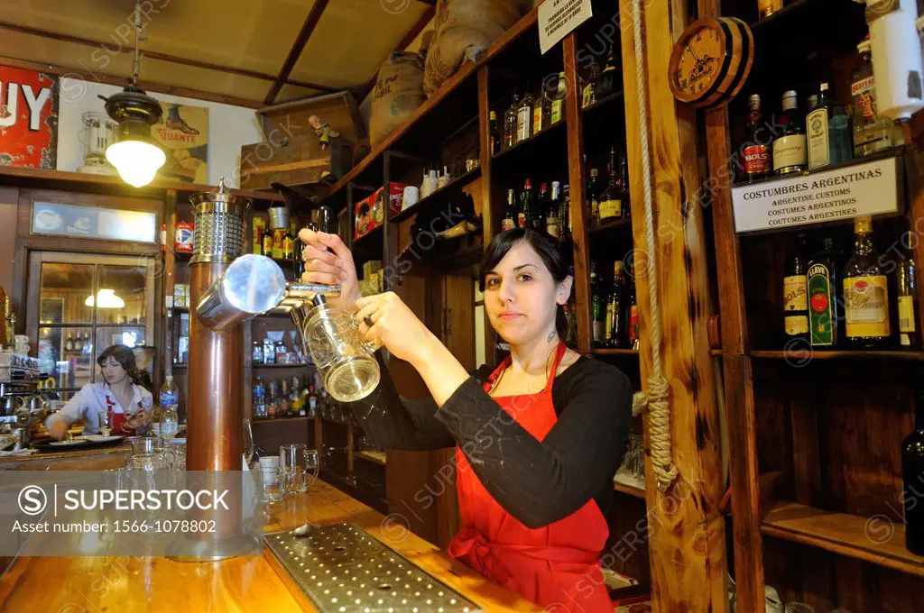 Luisina, barmaid of Ramos Generales, bar, restaurant, bakery, museum, located in an old warehouse, Ushuaia, Tierra del Fuego, Patagonia, Argentina, So...