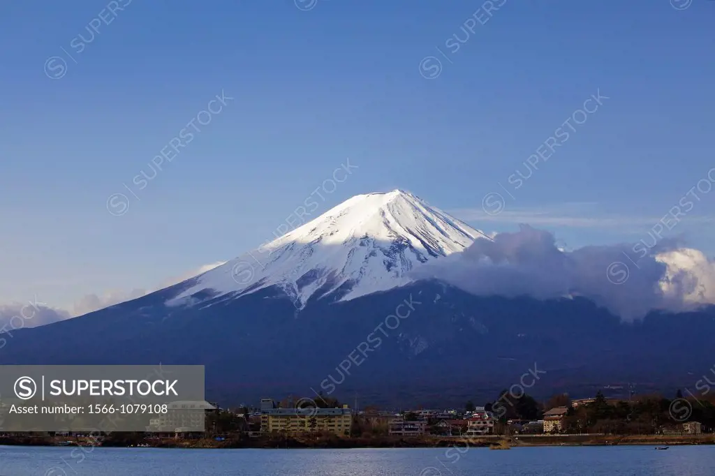 A view of Mt  Fuji at sunrise in front of Lake Kawaguchiko