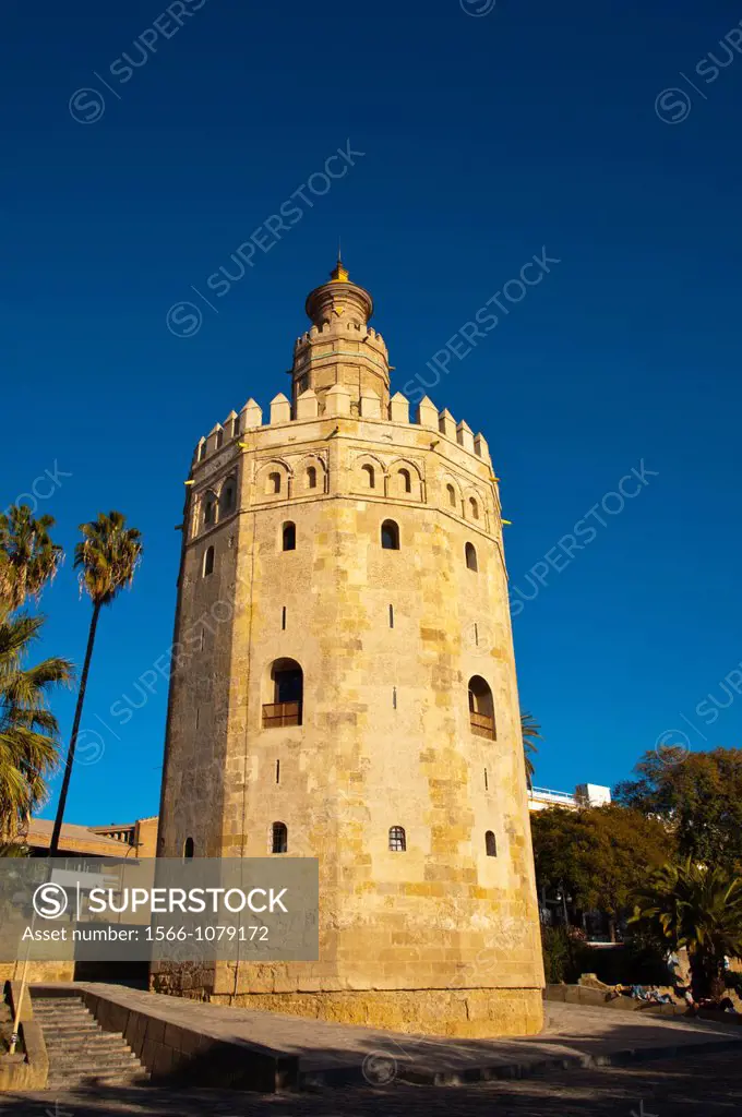 Torre del Oro tower 13th century along Paseo del Marques del Contadero riverside promenade Seville Andalusia Spain
