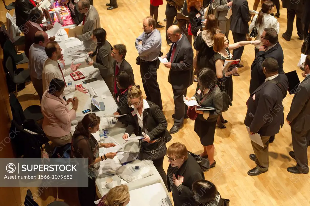 Job seekers attend a job fair on the Upper West Side in New York