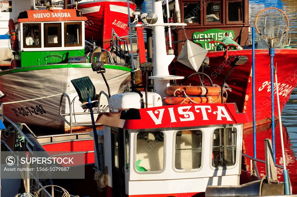 Fishing boats tied to the docks in Porto do Son, Coruña, Galicia, Spain