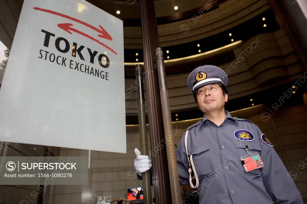 a guard stands at the entrance of the tokyo stock exchange to keep angry customers out the building In october 2008, the stockmarkets in Tokyo lost th...