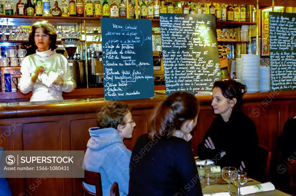 PARIS, France - Family Sharing Meals in French Bistro Restaurant ´Camille´ in The Marais Area, 24 Rue des Francs-Bourgeois, 75003