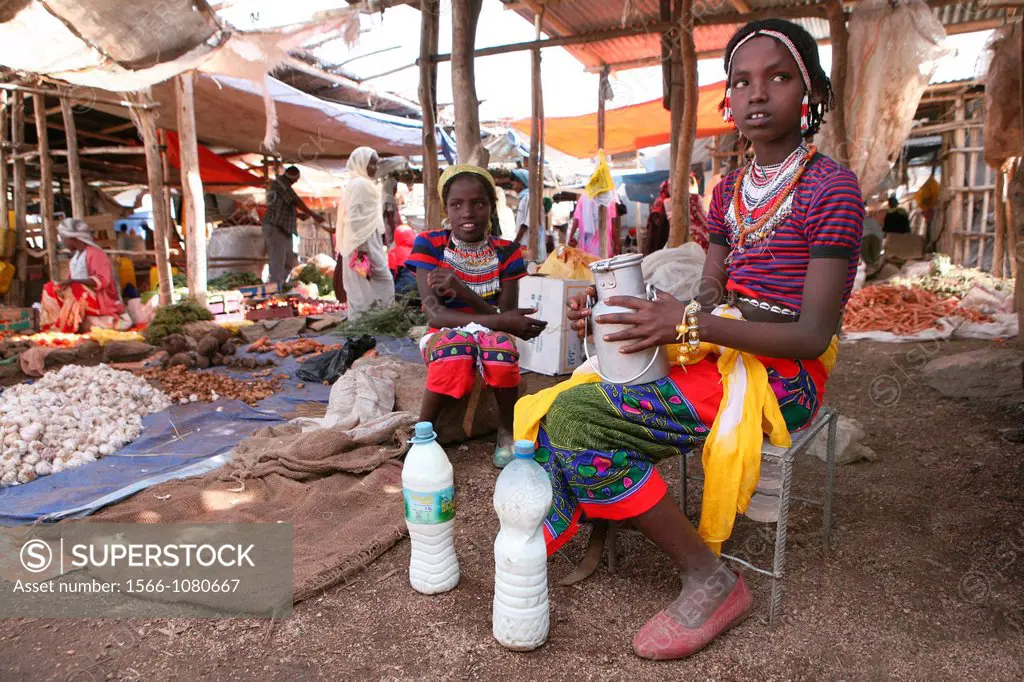 Selling goods such as milk, tea and vegetables on the market in Ethiopia, is a job carried out by women and girls
