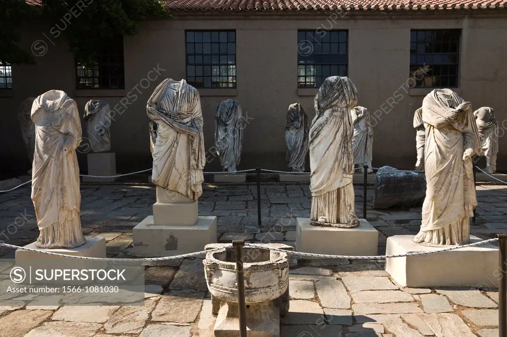 A display of headless statues in the musem courtyard at Ancient Corinth, Peloponnese, Greece