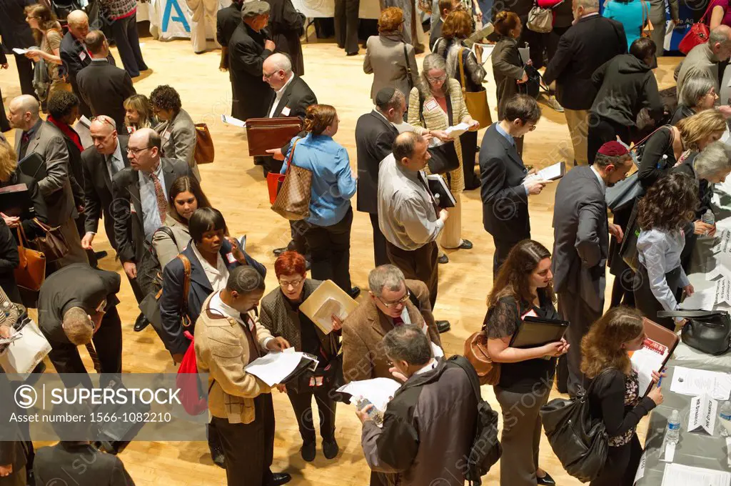 Job seekers attend a job fair on the Upper West Side in New York