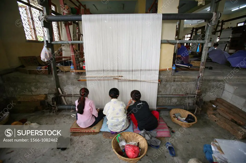 Tibetan women working in a carpet weavery in Nepal Most carpets are being exported to the West