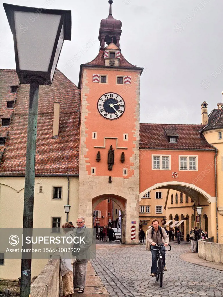 The old Salt House and Clock Tower mark the entrance to Old Town Regensburg where the Old Stone Bridge crosses the Danube River  Regensburg, Bavaria, ...