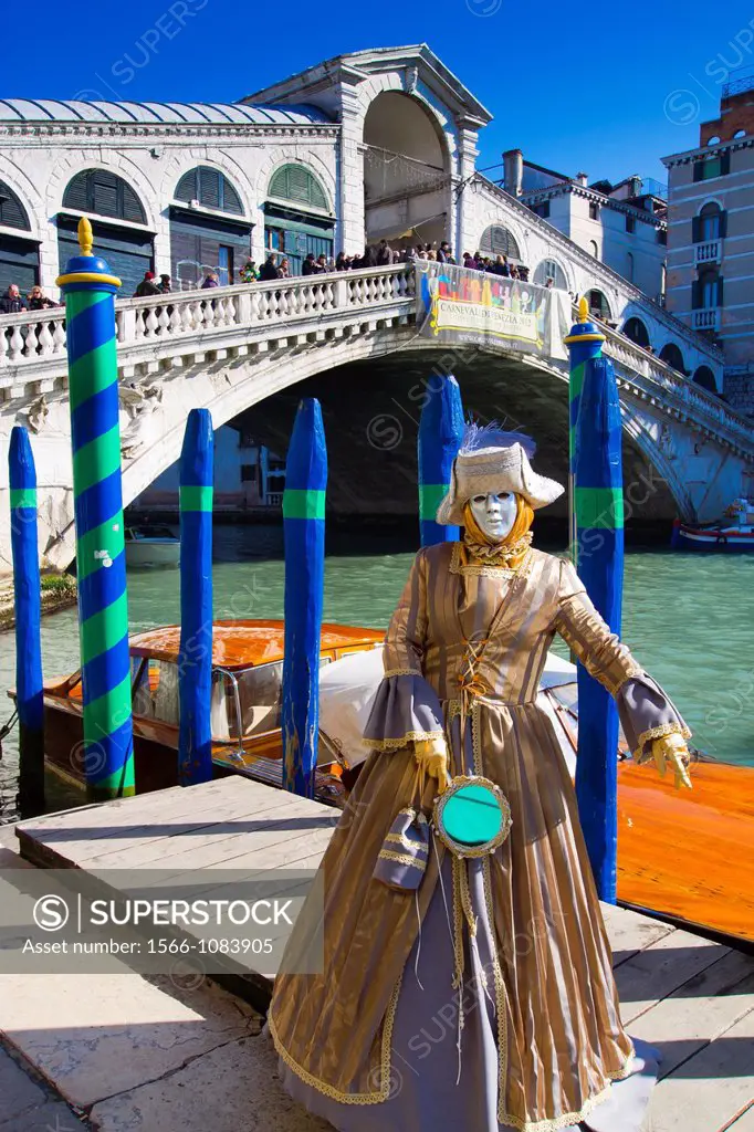 woman with fancy dress in Carnival of Venice  Rialto Bridge  Venice, Italy