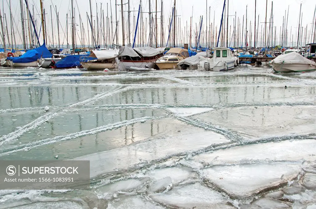 Severe winter, frozen boats trapped in ice, Versoix, canton of Geneva, Lake Geneva region, Lake Geneva shore, Switzerland