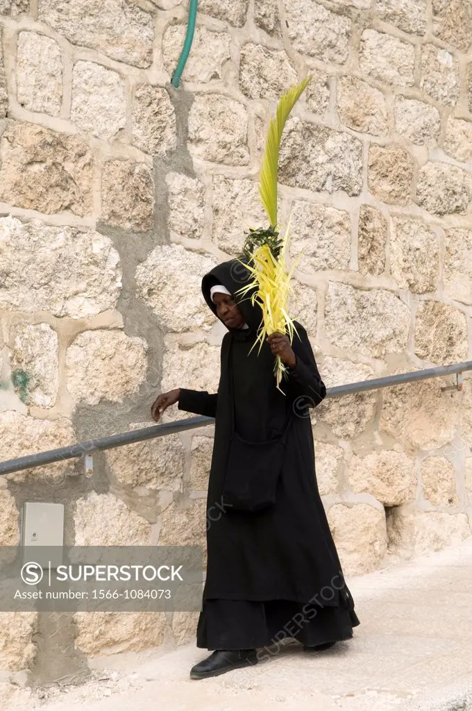 An Ethiopian pilgrim in the old city of Jerusalem on Palm Sunday day