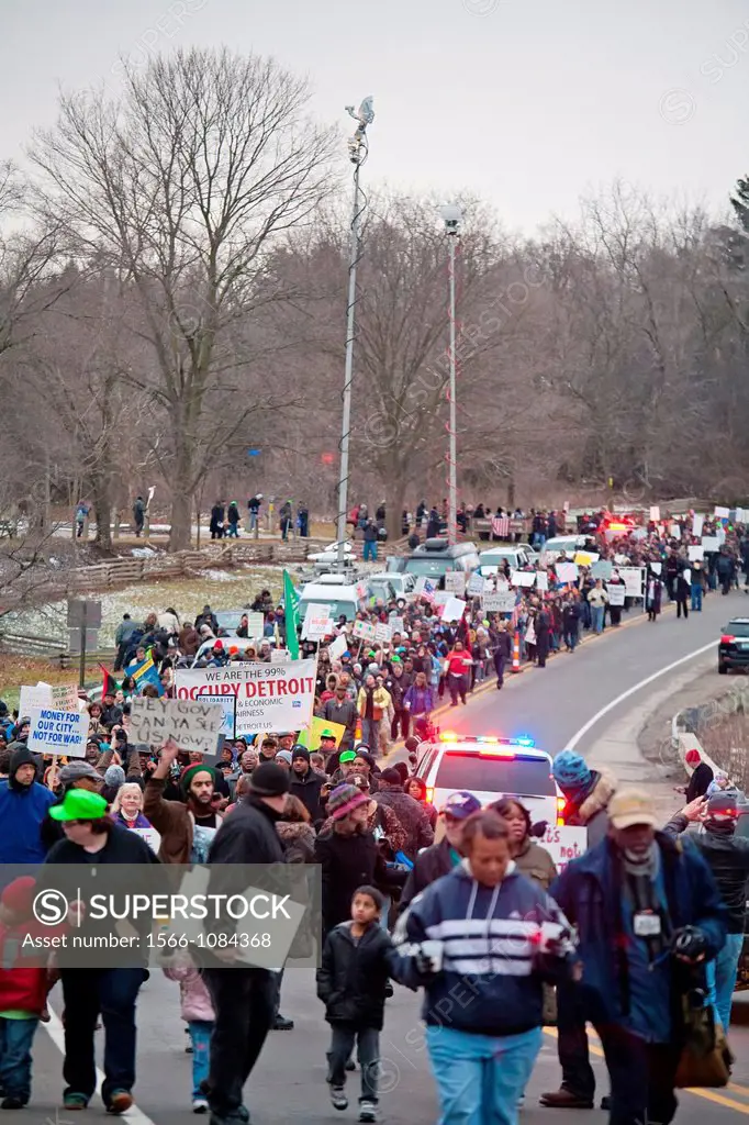 Superior Township, Michigan - About a thousand people marched to the home of Michigan Governor Rick Snyder to protest Michigan´s emergency financial m...