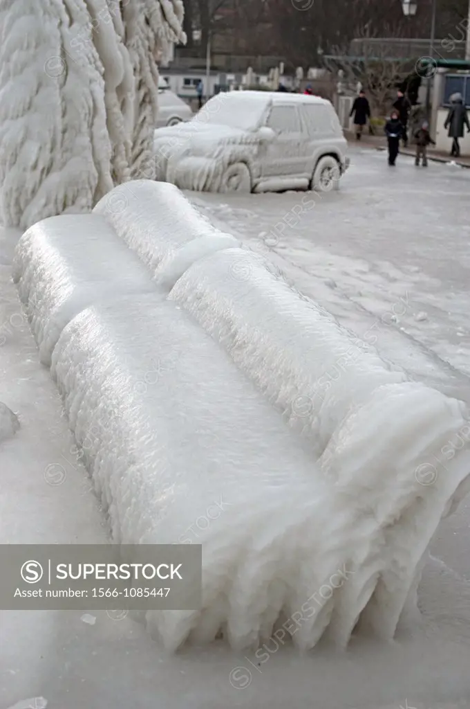 Severe winter, completely frozen benches and a car trapped in ice, Versoix, canton of Geneva, Lake Geneva region, Lake Geneva shore, Switzerland, wate...
