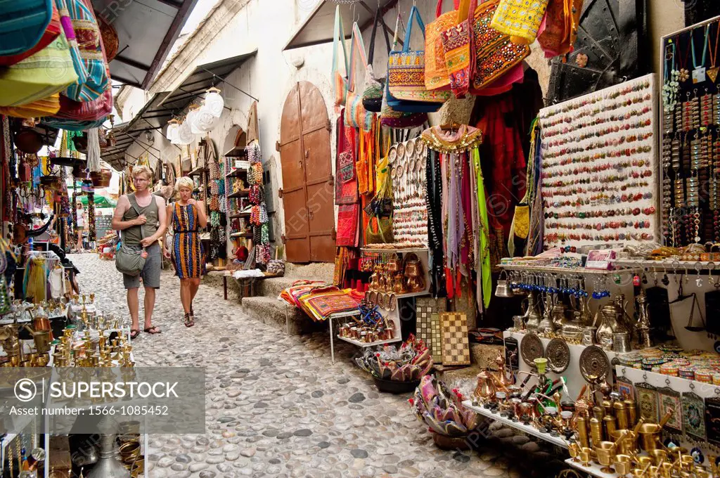 Souvenirs shops in a cobbled street known as Kujundziluk in Mostar old town Bosnia- Herzegovina  Balkans Europe