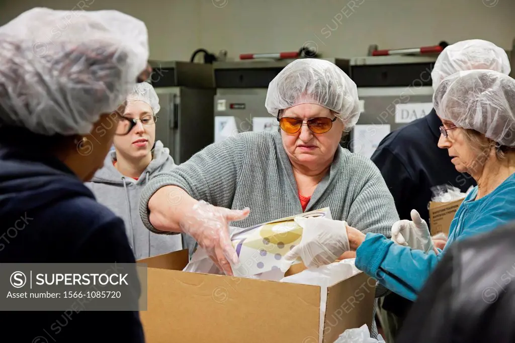 Detroit, Michigan - Volunteers pack Christmas meals for homebound senior citizens  The meals will be delivered through the Detroit Area Agency on Agin...