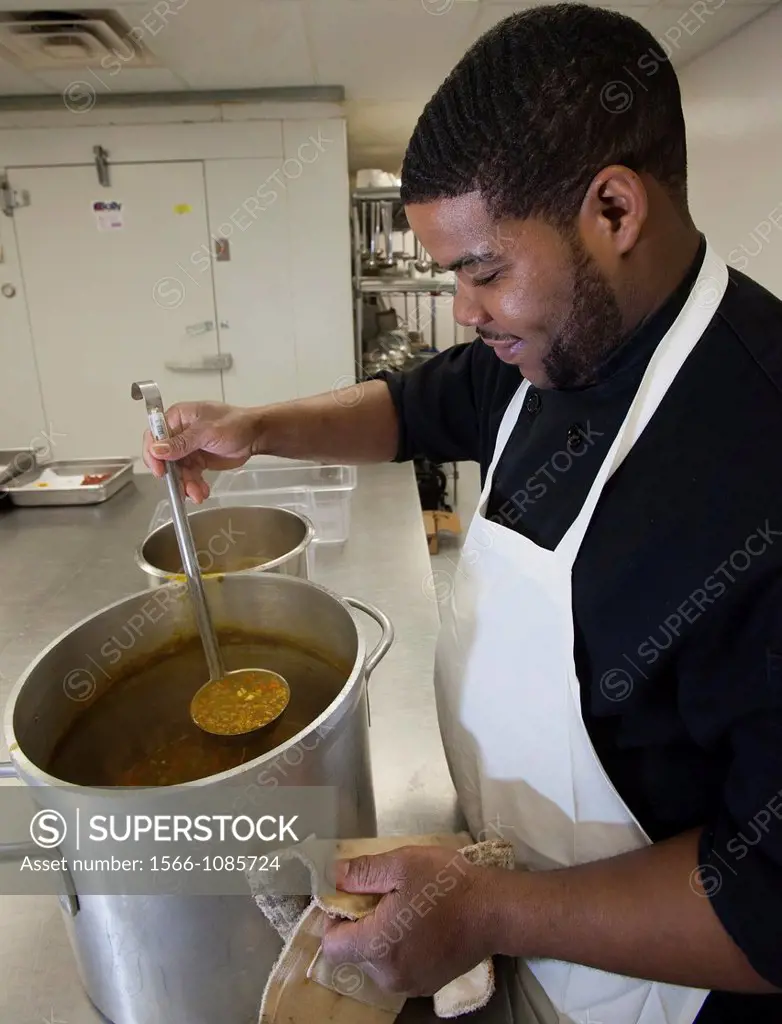 Detroit, Michigan - A worker prepares lentil soup at Colors Restaurant  The restaurant is a project of the nonprofit Restaurant Opportunities Center, ...