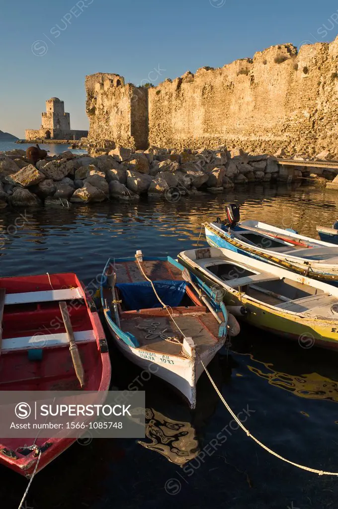 The Venetian sea walls of Methoni fortress and the Bourtzi tower seen from the old hourbour, Methoni, Messinia, Southern Peloponnese Greece  The tower...