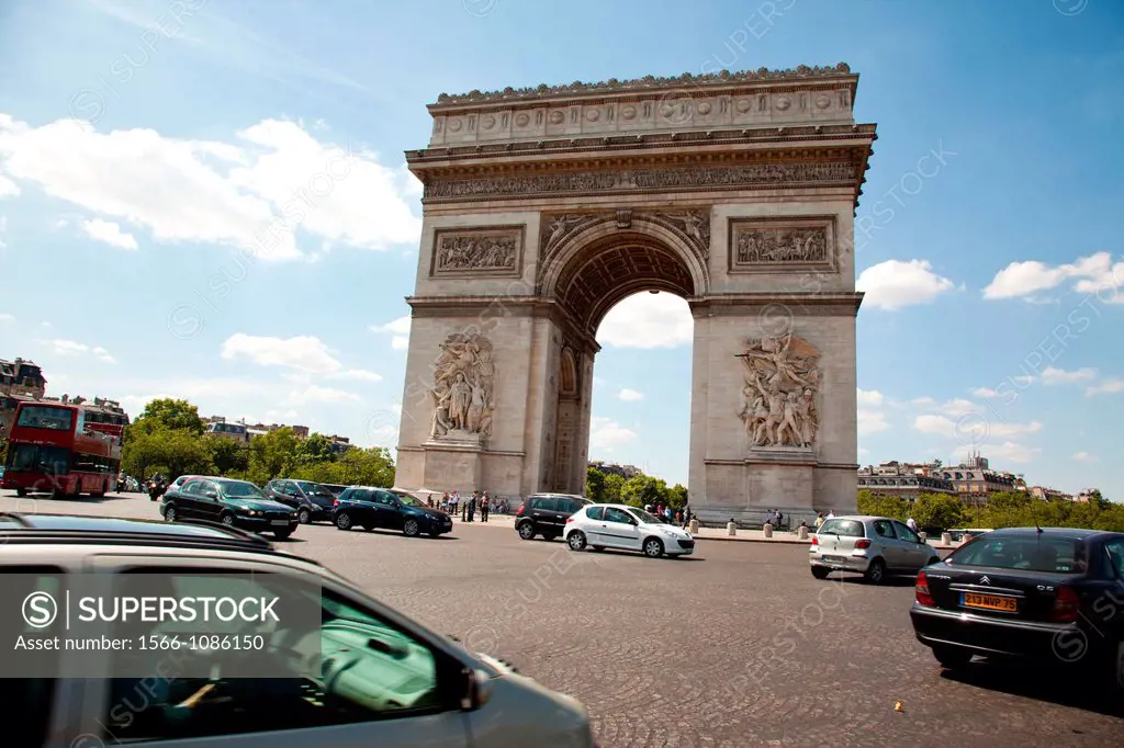 Driving around the Arc de Triomphe in Paris, France