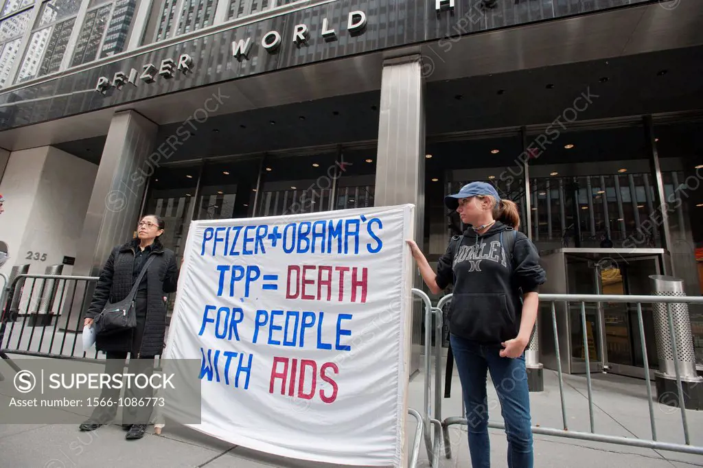Activists from several groups protest against the Trans-Pacific Partnership trade agreement in front of Pfizer drug company´s world headquarters in Ne...