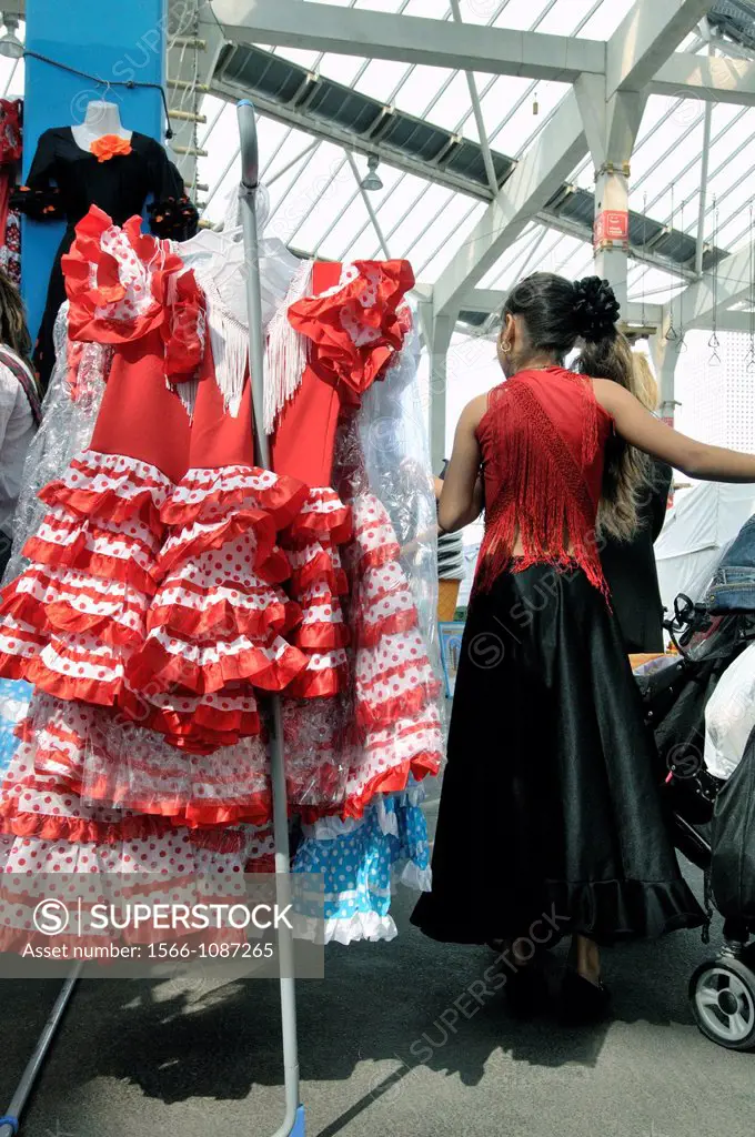 Dresses for sale at April fair, Forum area, Barcelona, Catalonia, Spain.