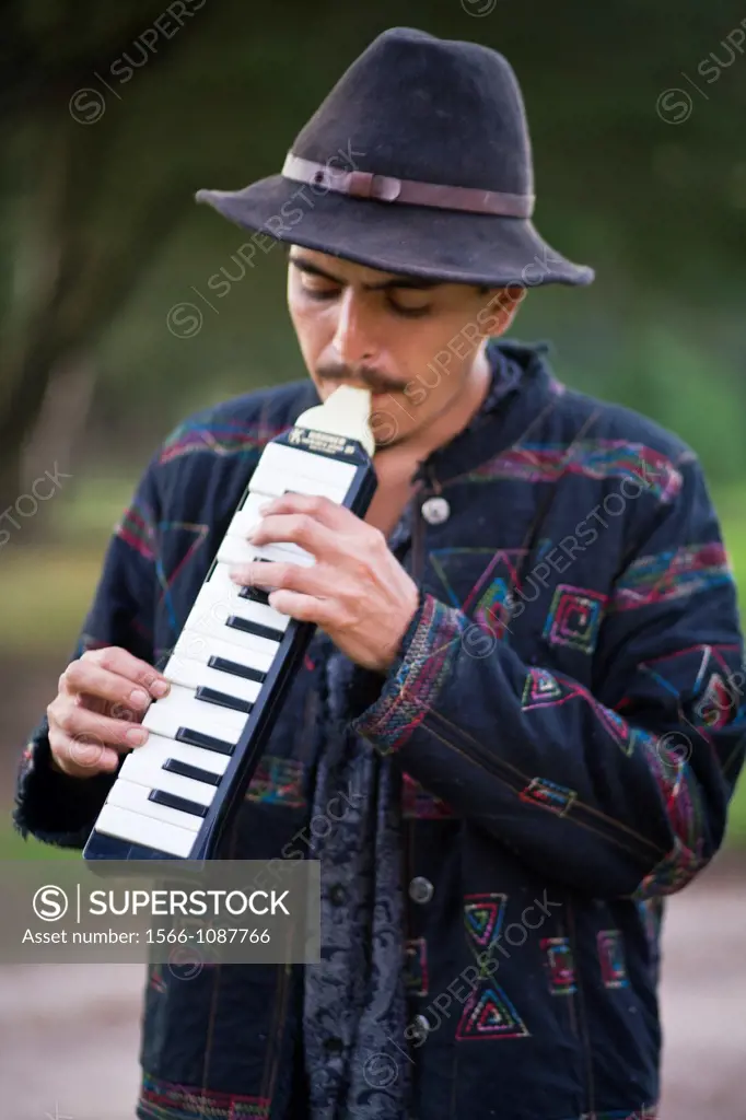 Man playing mouth piano