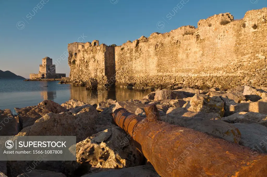 Sunrise on the Venetian walls of Methoni fortress and the Bourtzi tower a small fortified island, Methoni, Messinia, Southern Peloponnese Greece  The ...