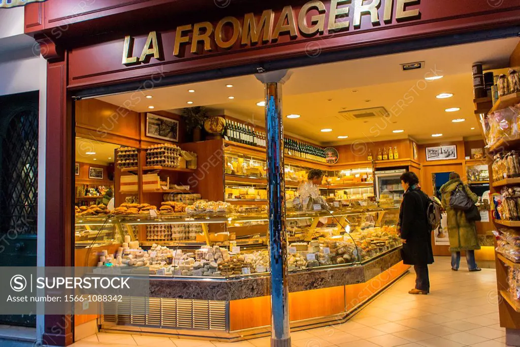 Paris, France, People Shopping in French Cheese Store, ´La Fromagerie´ on Montorgeuil Street, at Night
