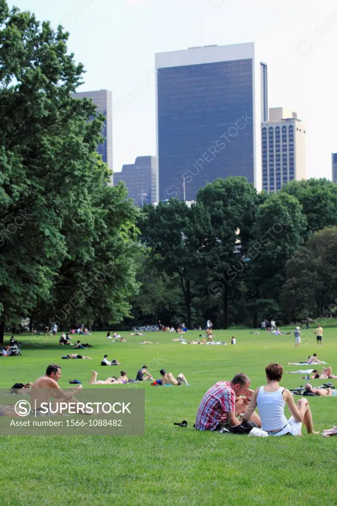 Visitors relax on the Great Lawn of Central Park  Manhattan  New York City  USA.