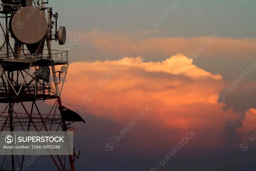 A telecomunication tower and a cloud