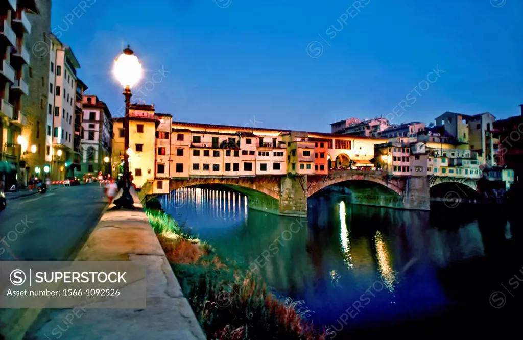 Florence, Italy, Ponte Vecchio, Old Bridge lit up at night, on the River Arno