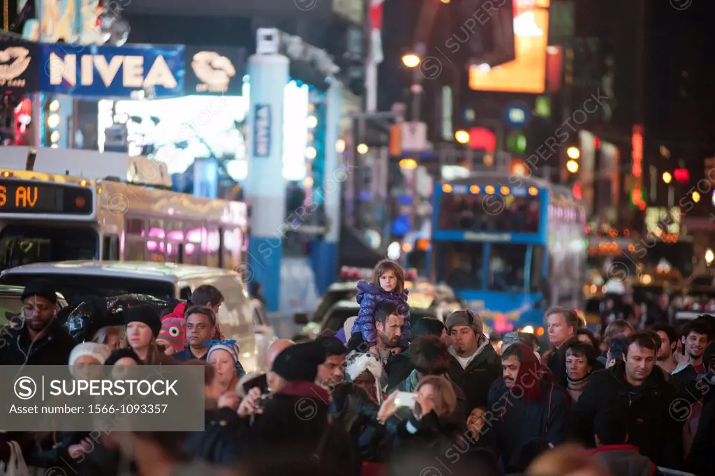 Thousands upon thousands of tourists pack Times Square on Friday, December 30, 2011, the night before New Year´s Eve Mild weather predicted for New Ye...