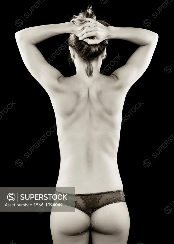 Young woman posing on her back  Elegance and Health