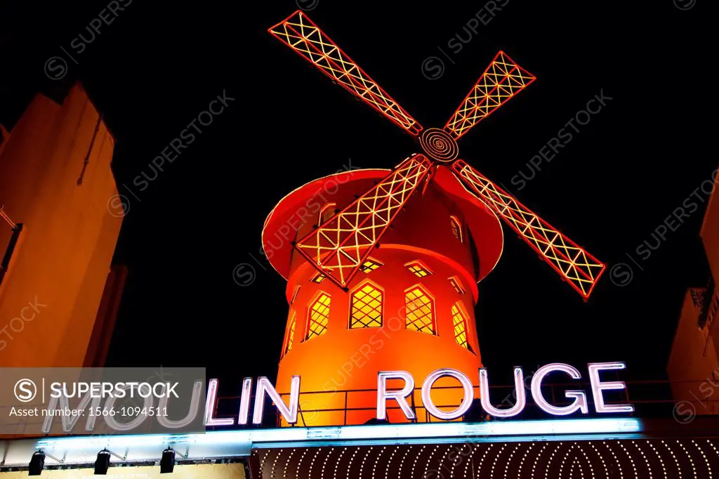 The Moulin Rouge in Paris at night, France