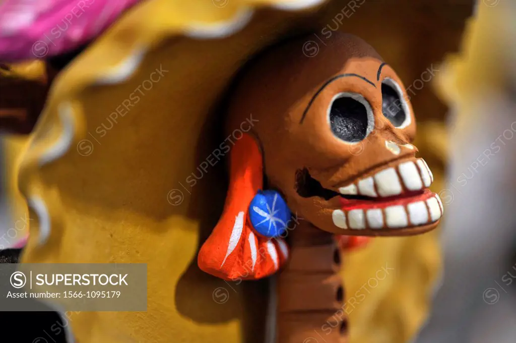 Mexican toys depicting the dead catrina