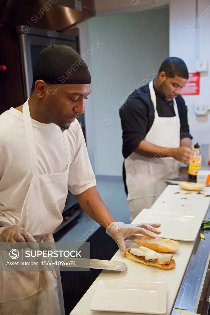 Detroit, Michigan - A worker prepares a sandwich at Colors Restaurant  The restaurant is a project of the nonprofit Restaurant Opportunities Center, w...