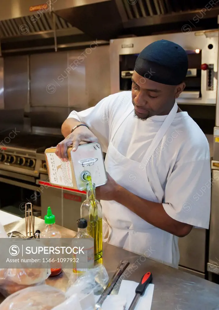 Detroit, Michigan - A worker prepares food in Colors Restaurant  The restaurant is a project of the nonprofit Restaurant Opportunities Center, which w...